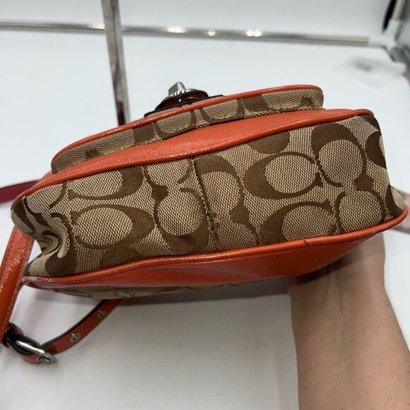 Coach Legacy Signature Canvas Crossbody Bag with a turn-lock closure. - Picture 8 of 11